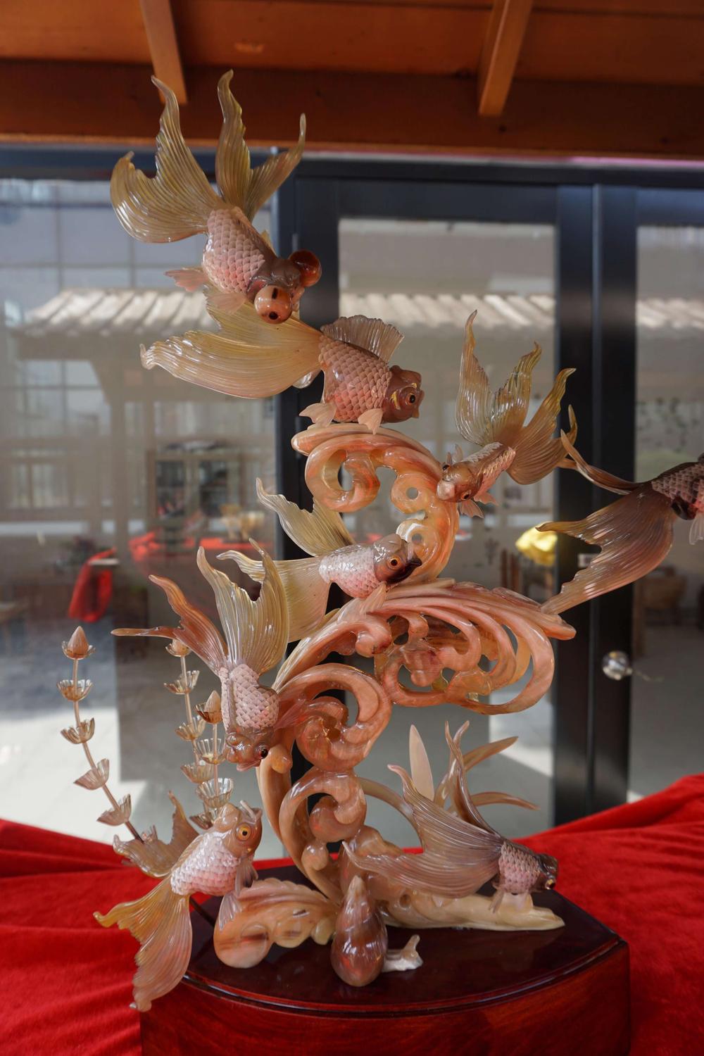 图为5月18日国际博物馆日，在合浦汉闾文化园进行展示的北海非遗项目之合浦角雕技艺.JPG
